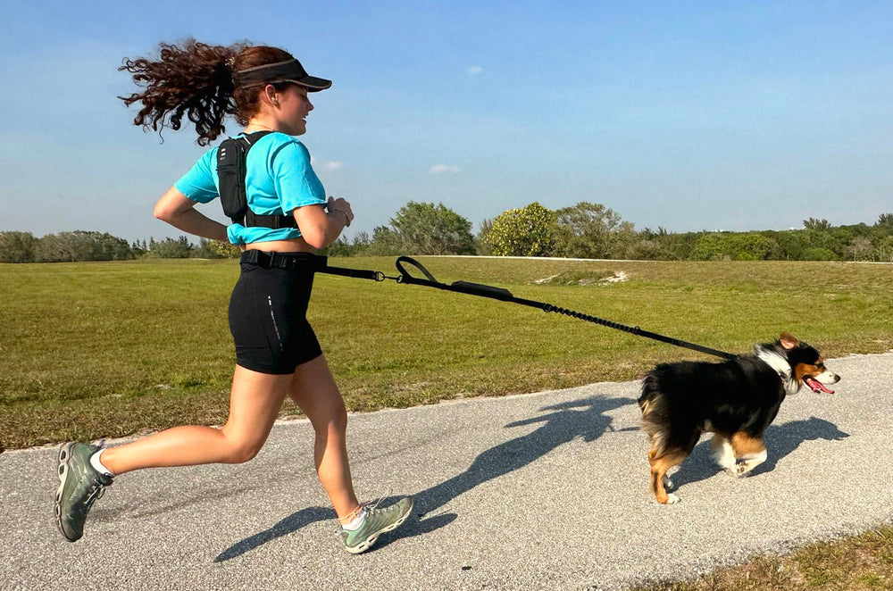 Woman running with hydration vest